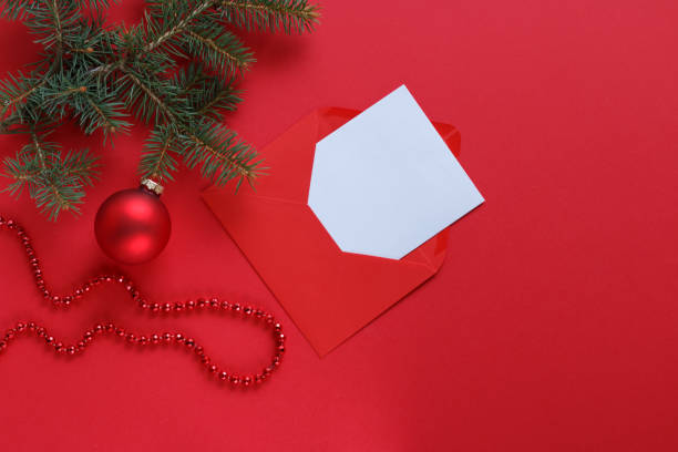 istock christmas card with red ornament and pine branch 2171669523
