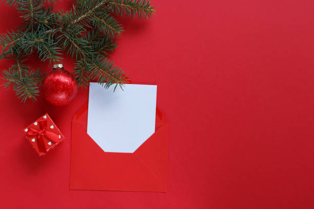 istock christmas card with red ornament and pine branch 2171669529