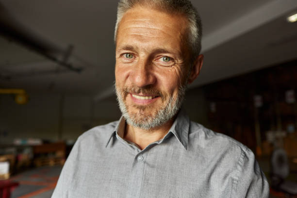 istock Happy mature businessman with green eyes. 2171677021