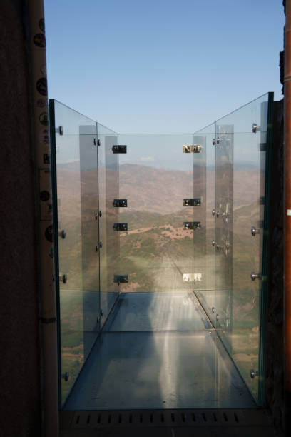 istock A beautiful glass observation platform that elegantly overlooks a scenic landscape 2171677122