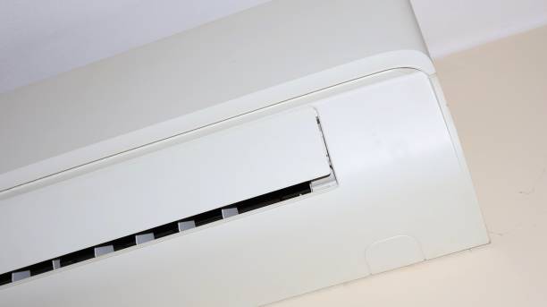 istock Heat pump at home hanging on the wall 2171680212