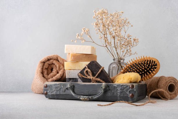 istock A beautifully arranged bathroom set featuring handmade soaps, a wooden back brush, and a natural sponge. 2171681999