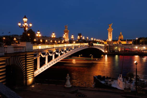 istock View at illuminated Pont Neuf on Seine River, Paris at night 2171682068