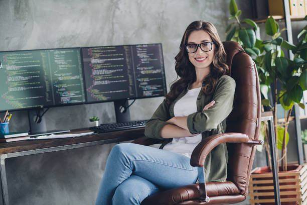 istock Portrait of cheerful attractive person web designer sit leather chair folded arms debugging database workstation indoors 2171683055