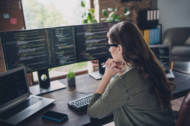 istock Photo of minded focused lady professional developer look display solve problems fix mistake operating system content indoor workstation 2171683903