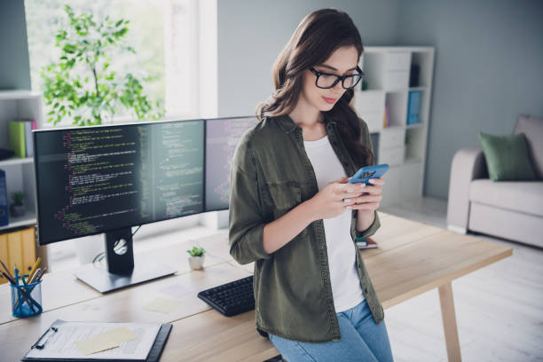 istock Photo of professional designer administrator use modern device chatting clients discuss interface new web site indoor room workstation 2171684037