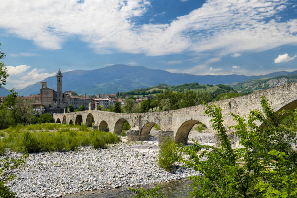 istock Gobbo Bridge also Devil Bridge or Ponte del Diavolo or Ponte Gobbo in Bobbio, Piacenza province, Trebbia Valley, Emilia Romagna, Italy 2171684965