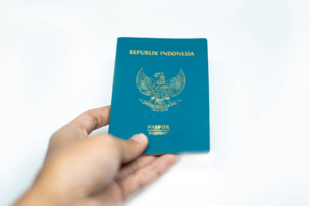 istock book passport indonesia white background 2171688583