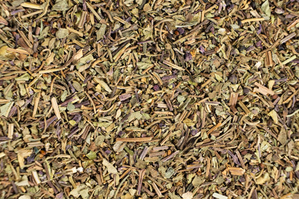 istock Dry basil spice seasoning macro texture top view 2171699096