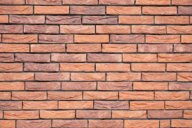 istock a new House is being built, the beginning of brickwork with red bricks, building 2171700599