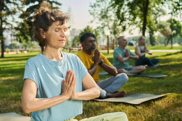 istock Woman doing yoga exercise on summer day 2171703690