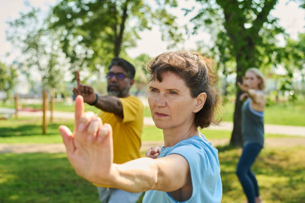 istock Showing exercise to intercultural people 2171703701