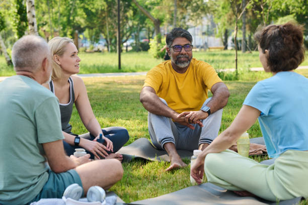 istock Talking to female yoga trainer at break 2171703708