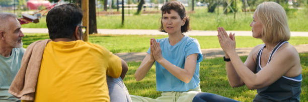 istock Discussing new yoga exercise outdoors 2171703736