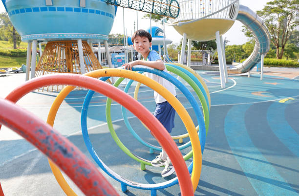 istock Asian boy child playing on playground 2171703883