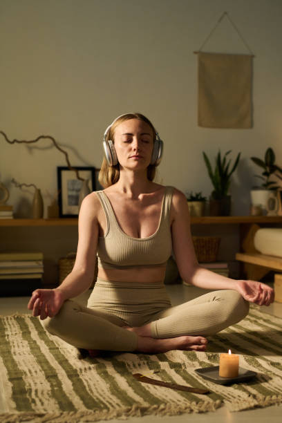 istock Yoga practice with meditation music 2171707141