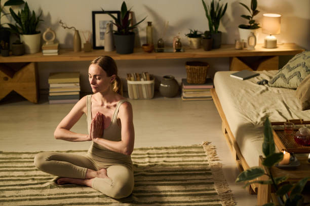 istock Woman keeping hands in namaste gesture 2171707214