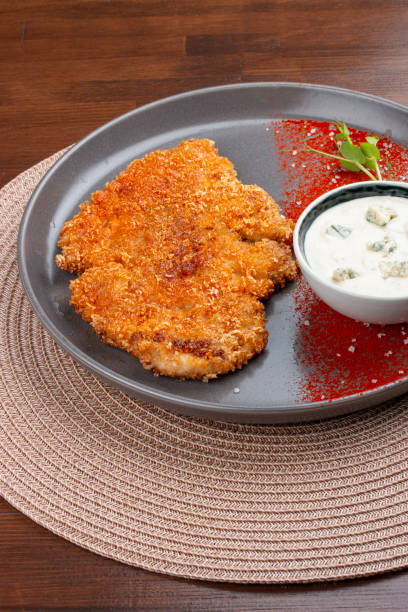 istock Chicken schnitzel with blue cheese sauce and paprika 2171712270