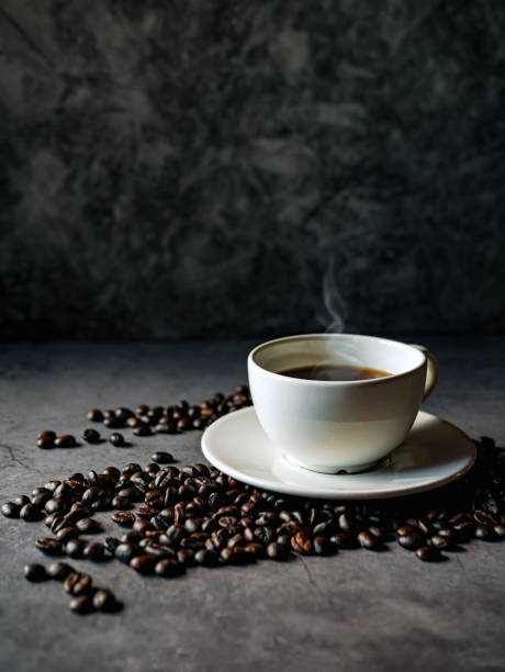 istock Coffee cup and coffee beans on gray background, Black coffee cup aromatic 2171718310