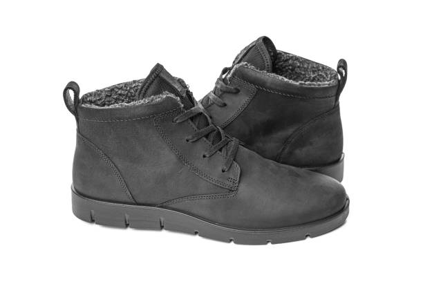 istock Black women's winter boots isolated on white. 2171718826