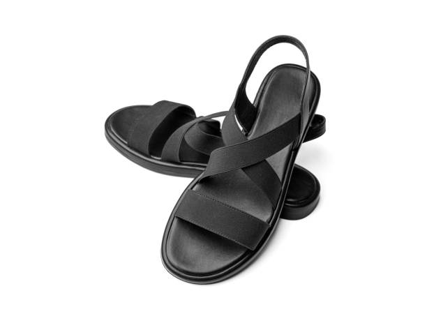 istock Women's black leather sandals isolated on white. 2171718834