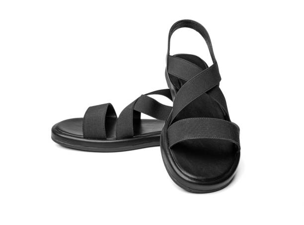 istock Women's black leather sandals isolated on white. 2171718846