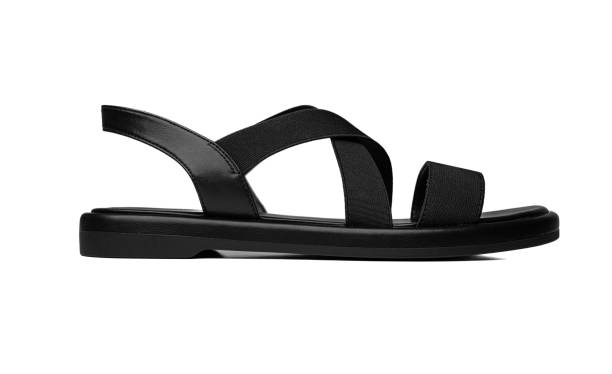 istock Women's black leather sandals isolated on white. 2171718852