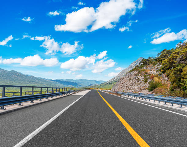 istock Highway in a beautiful mountainous area. 2171719056