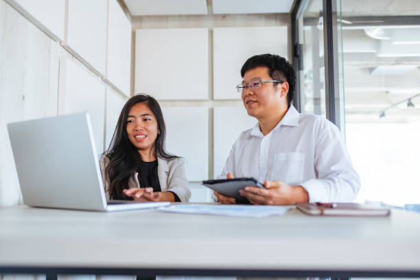 istock Asian Business Professionals Working Together 2171722230