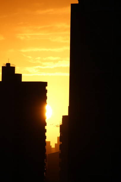 istock sunset in the city 2171723177