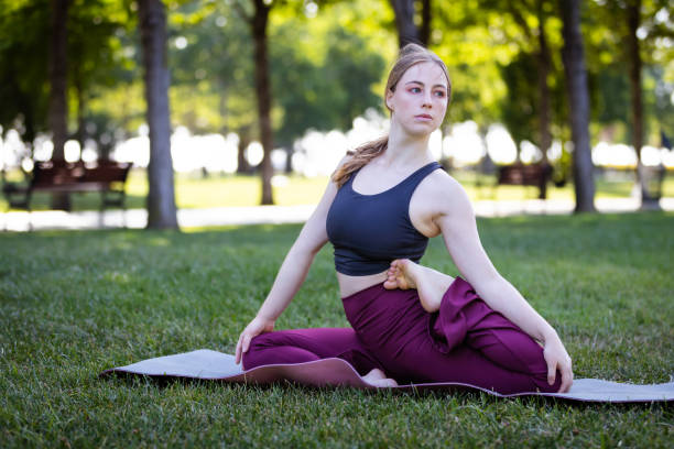 istock Flexible young woman is exercising on the outside. 2171723533