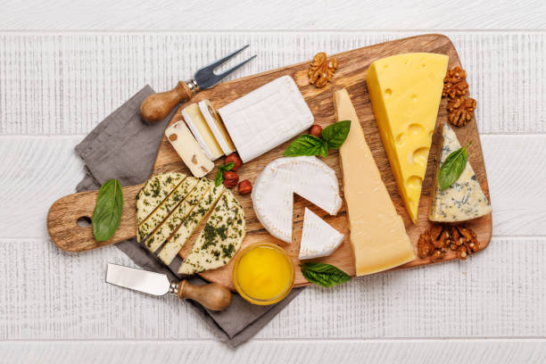 istock An assortment of various cheeses arranged on a board, highlighting different textures 2171724544