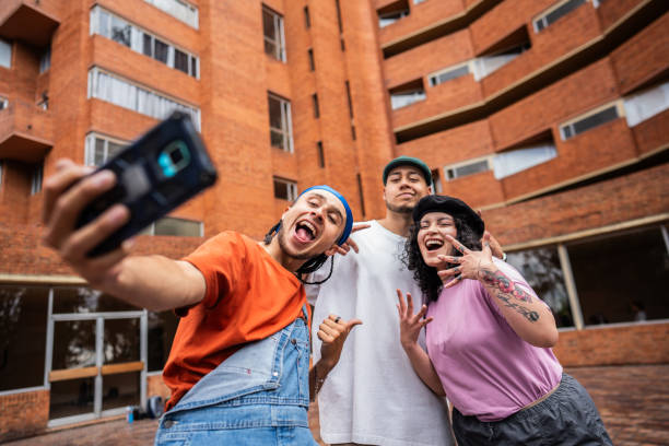 Friends taking selfie outdoors