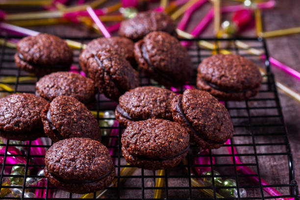 istock Baci de Alassio, Italian cookie made from nut dough and filled with chocolate ganache. 2171731073