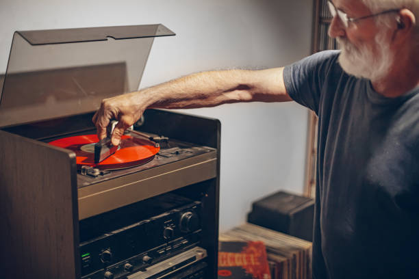 istock Man cleaning vinyl record 2171735427