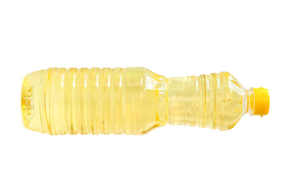 istock Light yellow cooking or vegetable oil in small plastic bottle isolated on white background with clipping path 2171737435