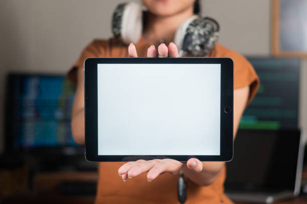 Person Holding a Tablet with Blank Screen