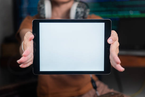 istock Young Woman Holding a Blank Tablet 2171743826