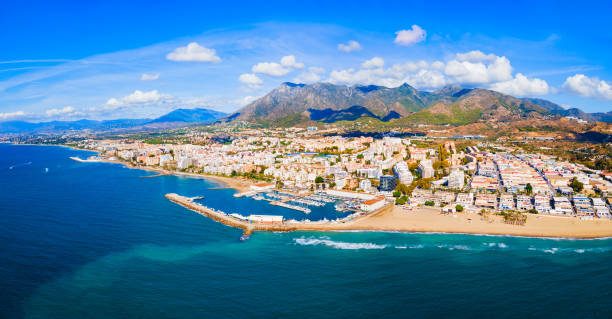 istock Marbella city beach and port aerial panoramic view 2171750603