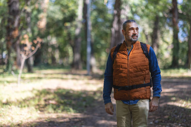 istock Relaxed man experiences joy in wooded surroundings. 2171760883