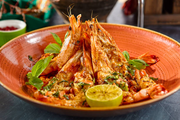 istock Grilled Shrimp with Lime - Fresh Seafood on a Plate Perfectly Served 2171764414
