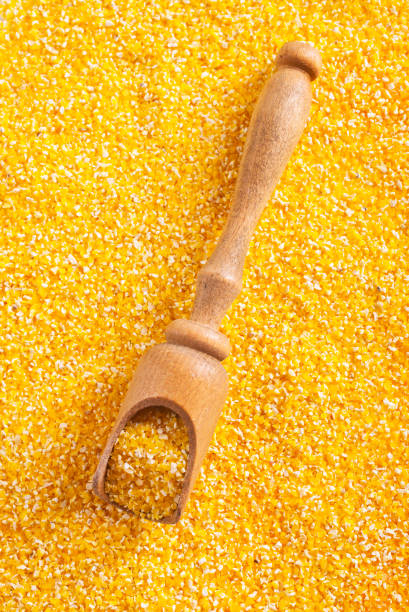 raw corn porridge texture, corn porridge in spoon