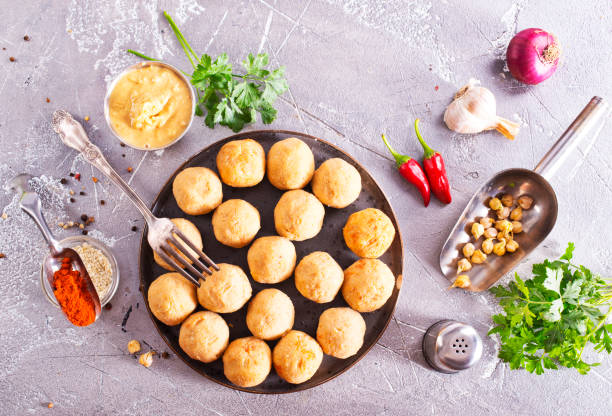 istock Falafel (Middle East): Deep-fried balls made from ground chickpeas mixed with herbs and spices. 2171767675