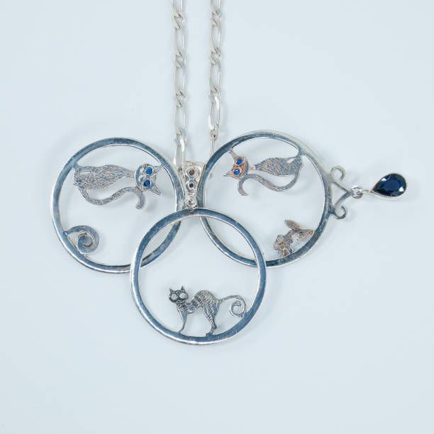 istock Silver necklace with funny cat symbols 2171772526