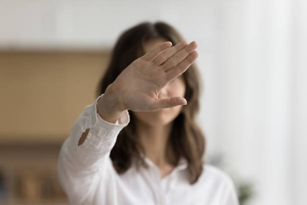 istock Young lady showing hand gesture against home violence 2171773467