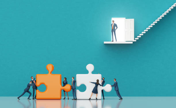 istock Business people working together with puzzles. 3d rendering 2171774319