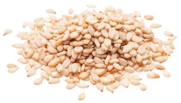 istock White seeds of sesame isolated on white background. 2171777444
