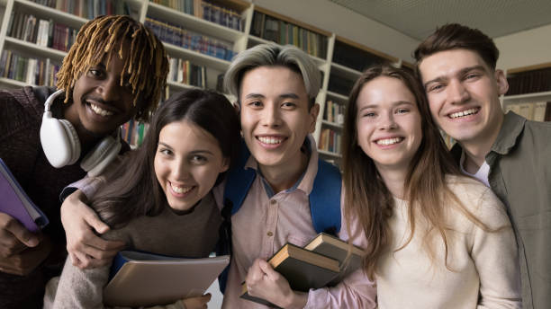 istock Happy young classmates team having fun in college, university library 2171777593