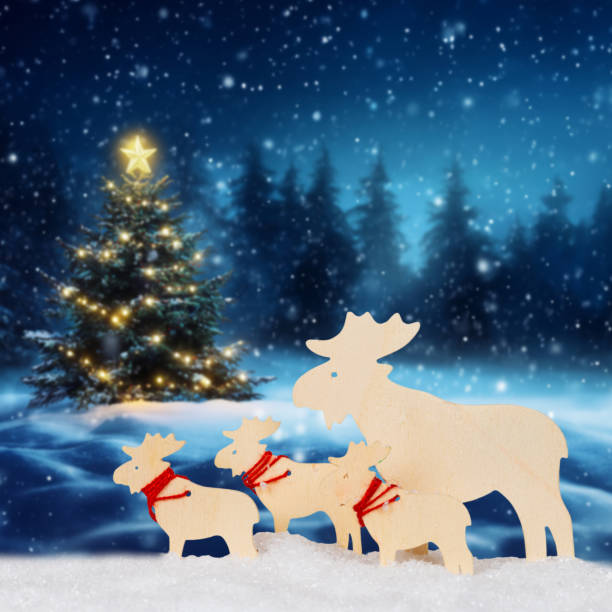 Christmas card with reindeers elks tree and copyspace copy space square snow