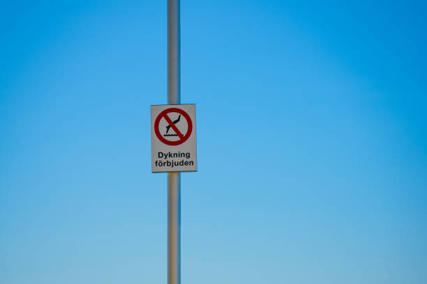 istock Sign prohibiting diving from a pier.. 2171784007